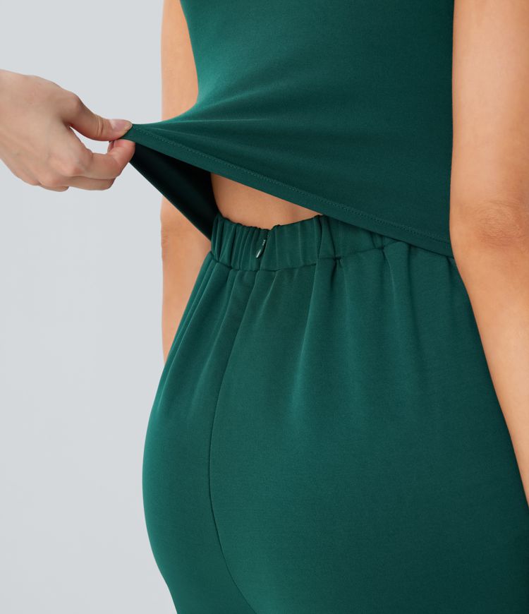 Combinaison de fête sans manches froncée avec décolleté en V, poches latérales et fermeture éclair invisible - Easy Peezy