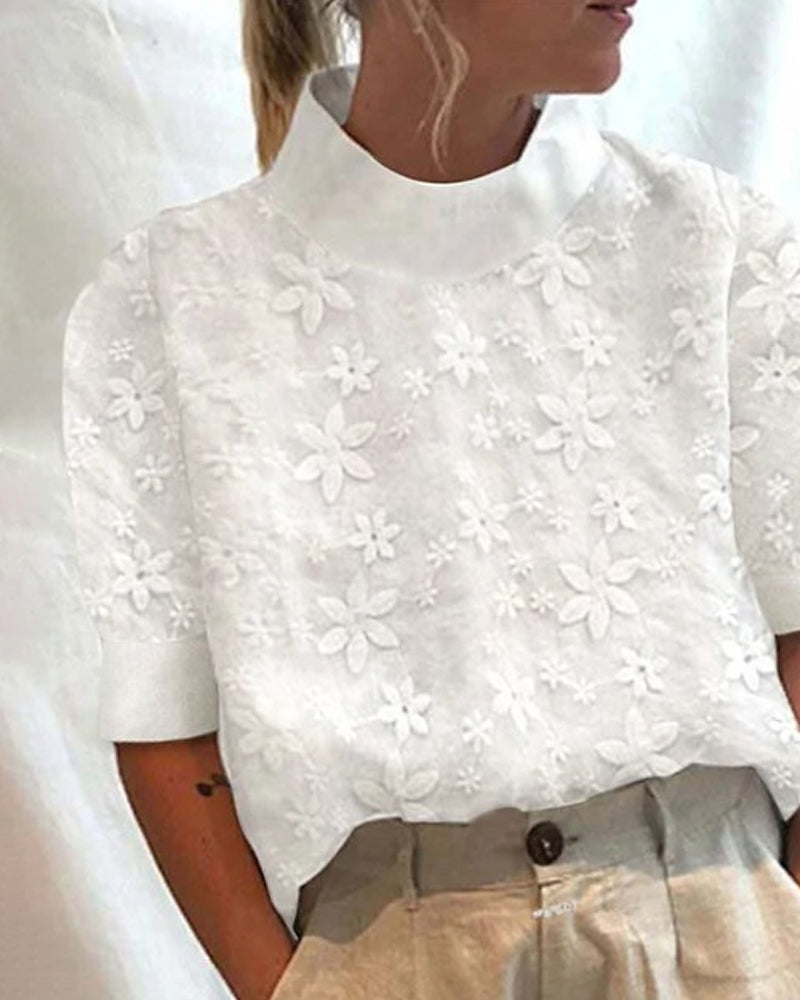 Doutzen - Blouse avec col montant brodé uni